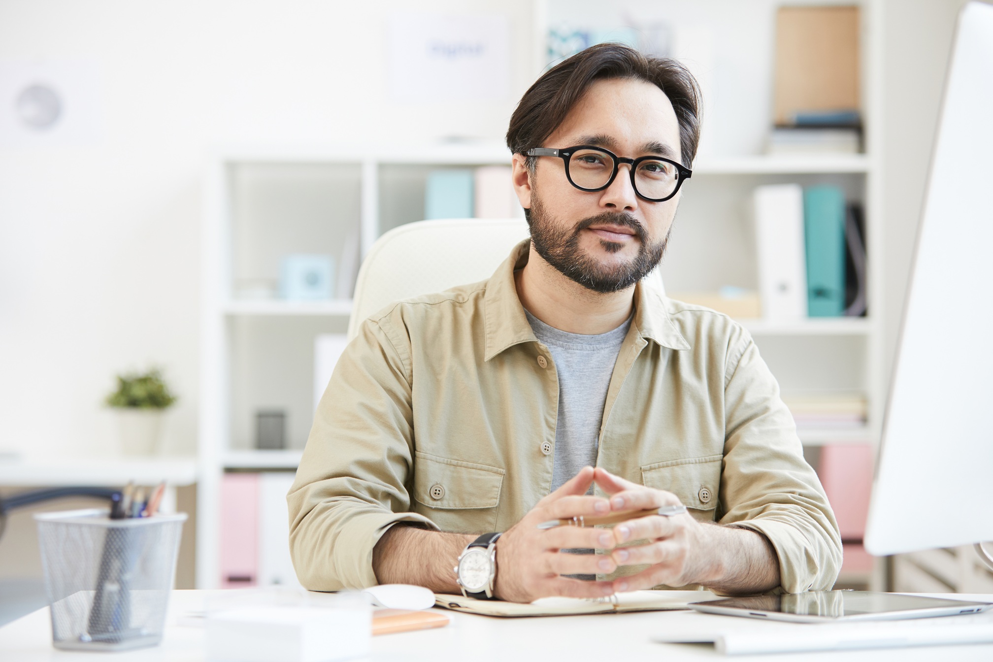 Confident young art director in office Confident Young Art Director In Office G4HEMW6